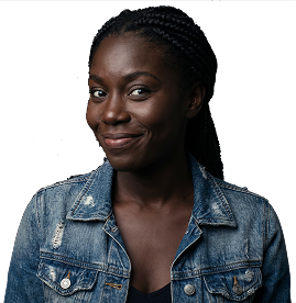 A contestant in a denim jacket, mid-smile